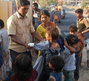 Murugan on his rounds taking care of abandoned kids on Kochi streets.