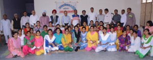 A group picture of all the girls in the school receivng support from IFCARE taken on the annual day function of the NGO. The adults standing in the back are the board members of IFCARE and some of the parents of the girls in the school. 